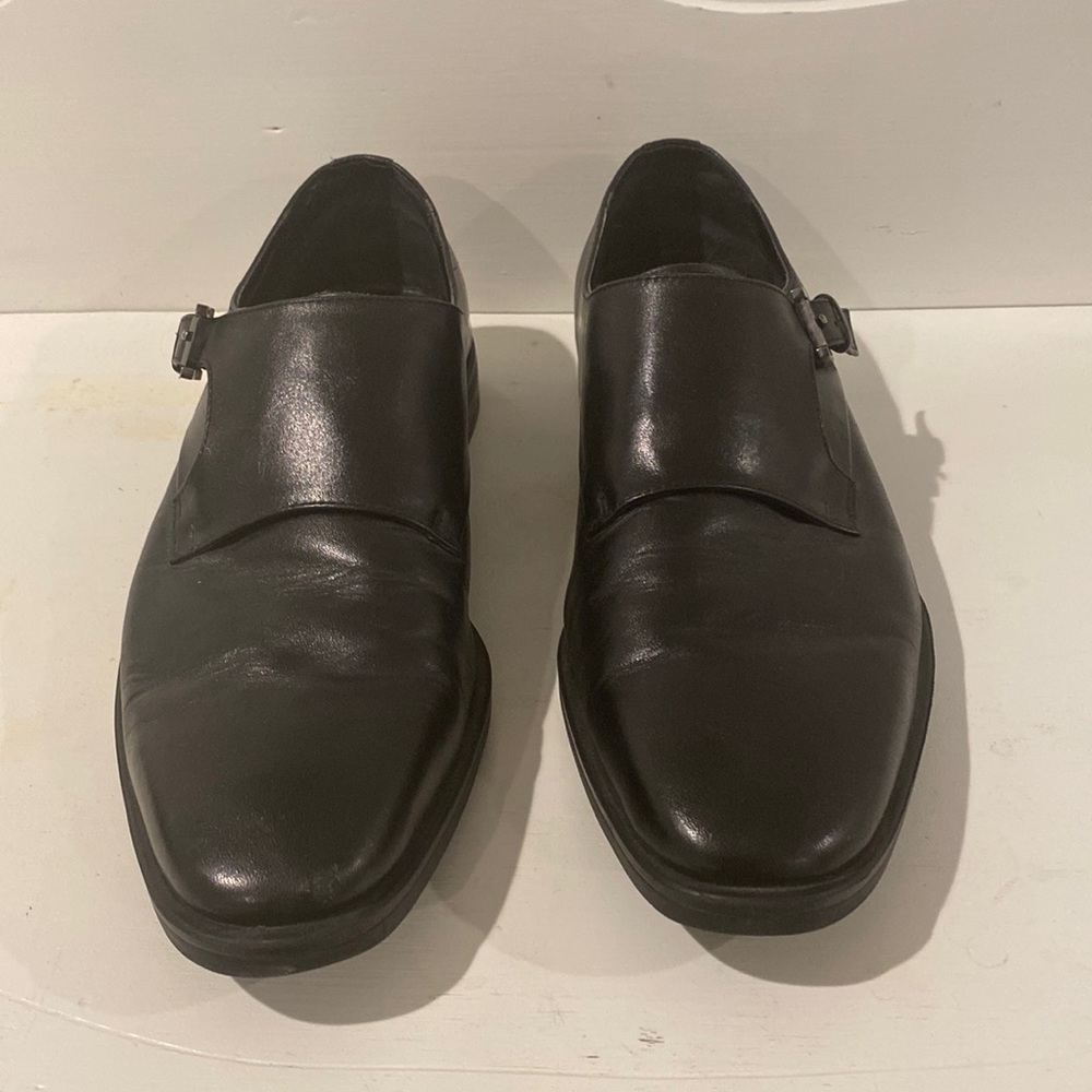 Calvin Klein black monk strap shoes. Gunmetal buckles. Size 9M.